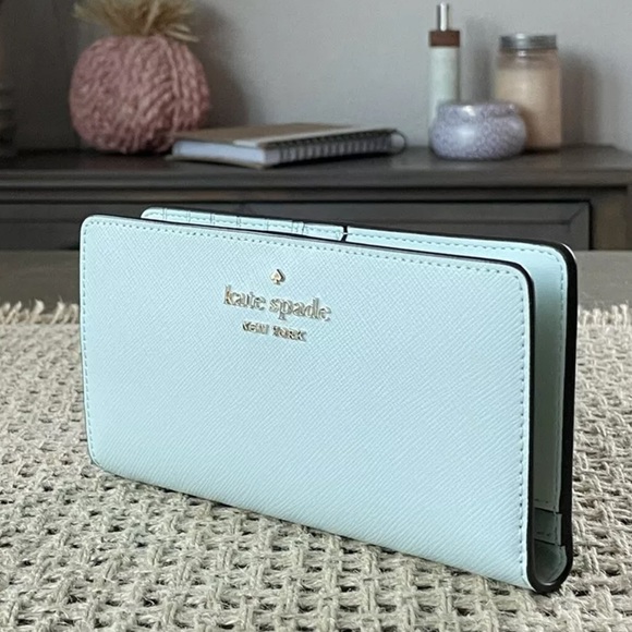 Kate Spade New York Staci Large Slim Bifold Wallet In Crystal Blue